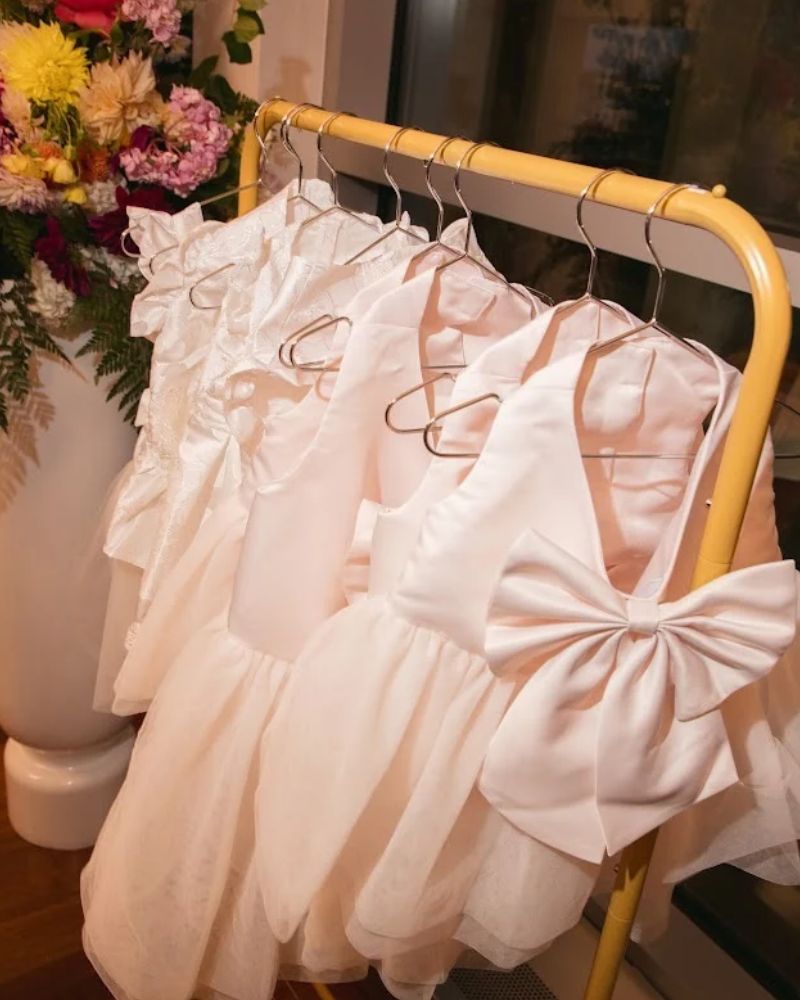 White dog wedding dresses with tulle, lace and bows from David’s Bridal’s Puppy Love Collection.
